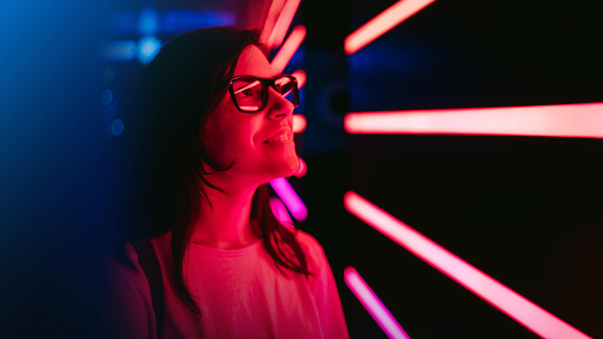 Curious woman and neon lights